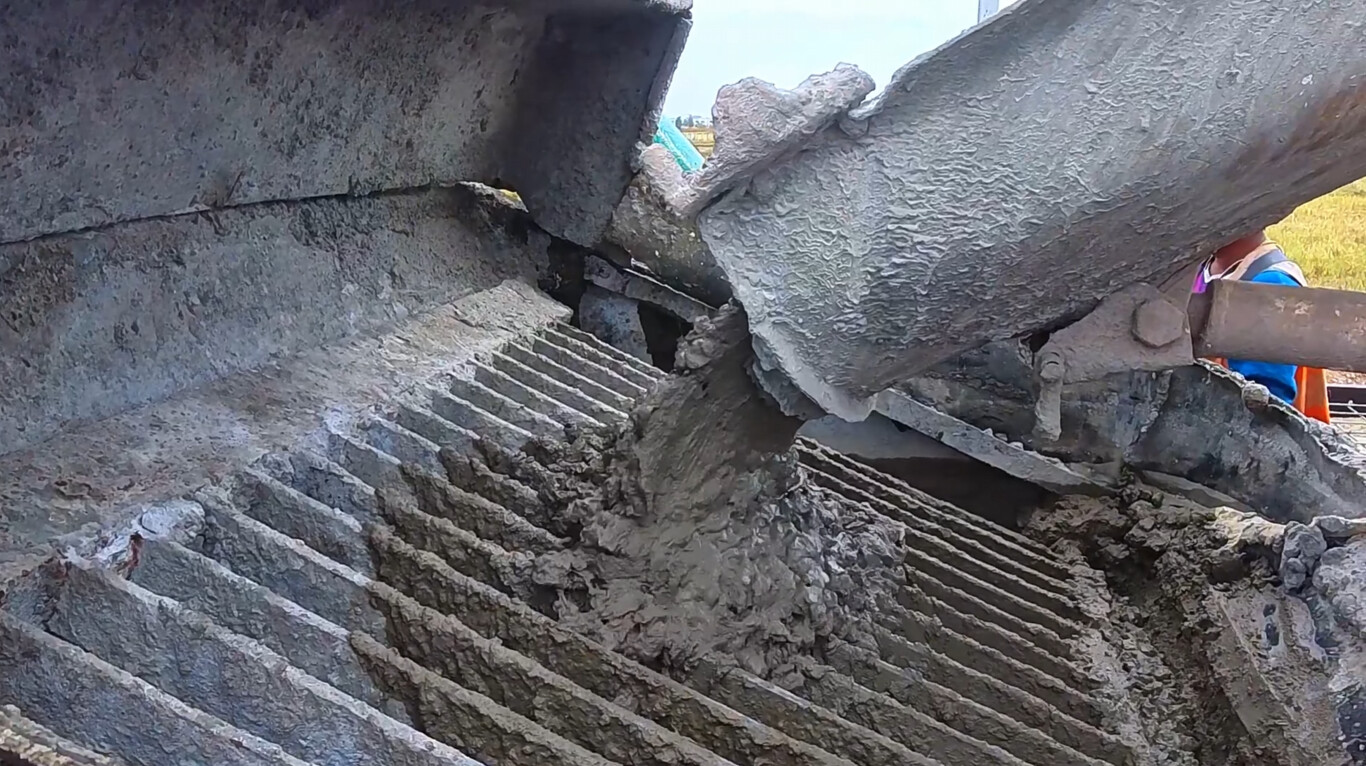 Concrete truck pouring slab in Opelika, AL